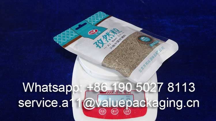 weighting-of-50-grams-cumin-seeds-poly-bag-pouch